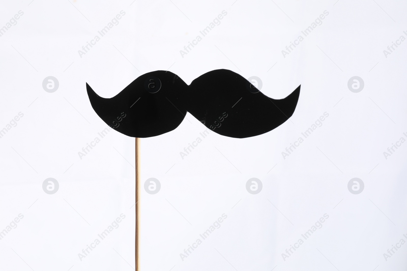 Photo of Fake paper mustache party prop against white background