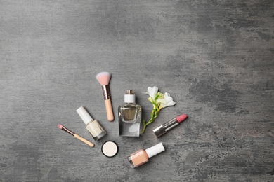 Photo of Flat lay composition with cosmetic products on grey background