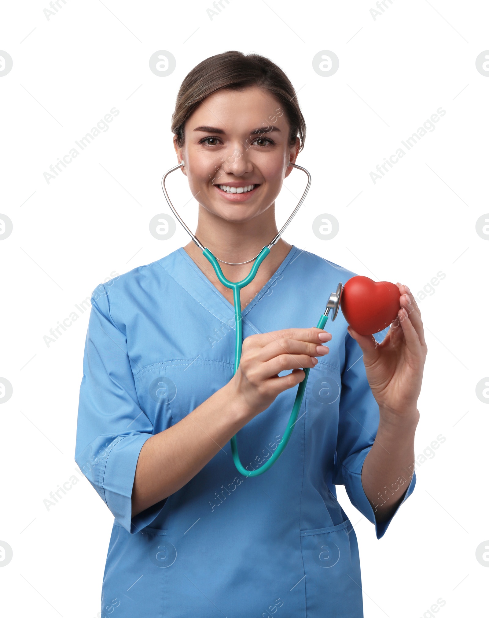 Photo of Doctor with stethoscope and red heart on white background. Cardiology concept