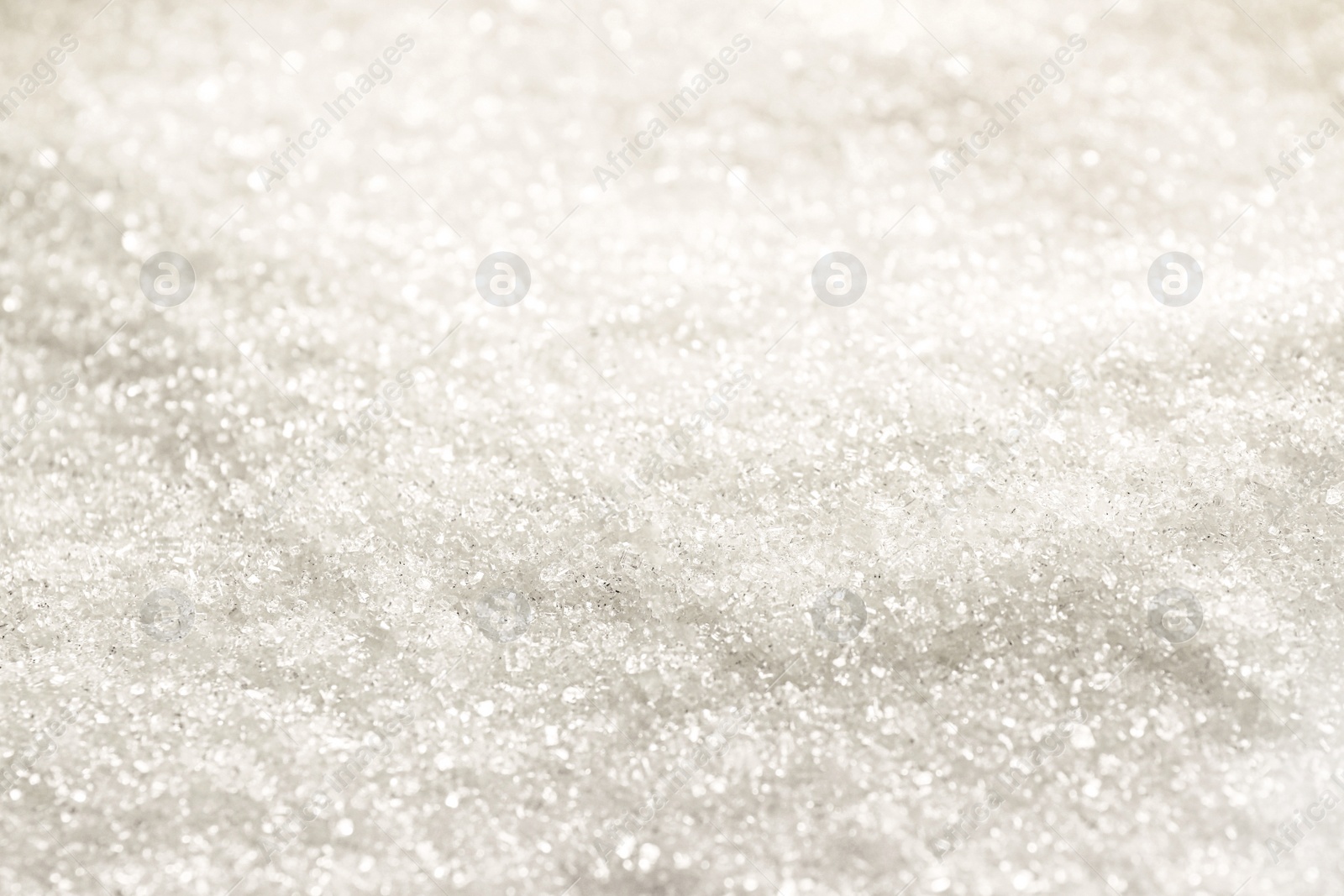 Photo of Pile of granulated sugar as background, closeup