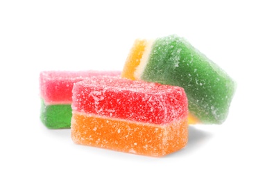 Delicious colorful chewing candies on white background