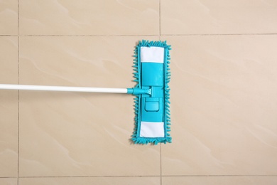 Cleaning of floor with mop, top view