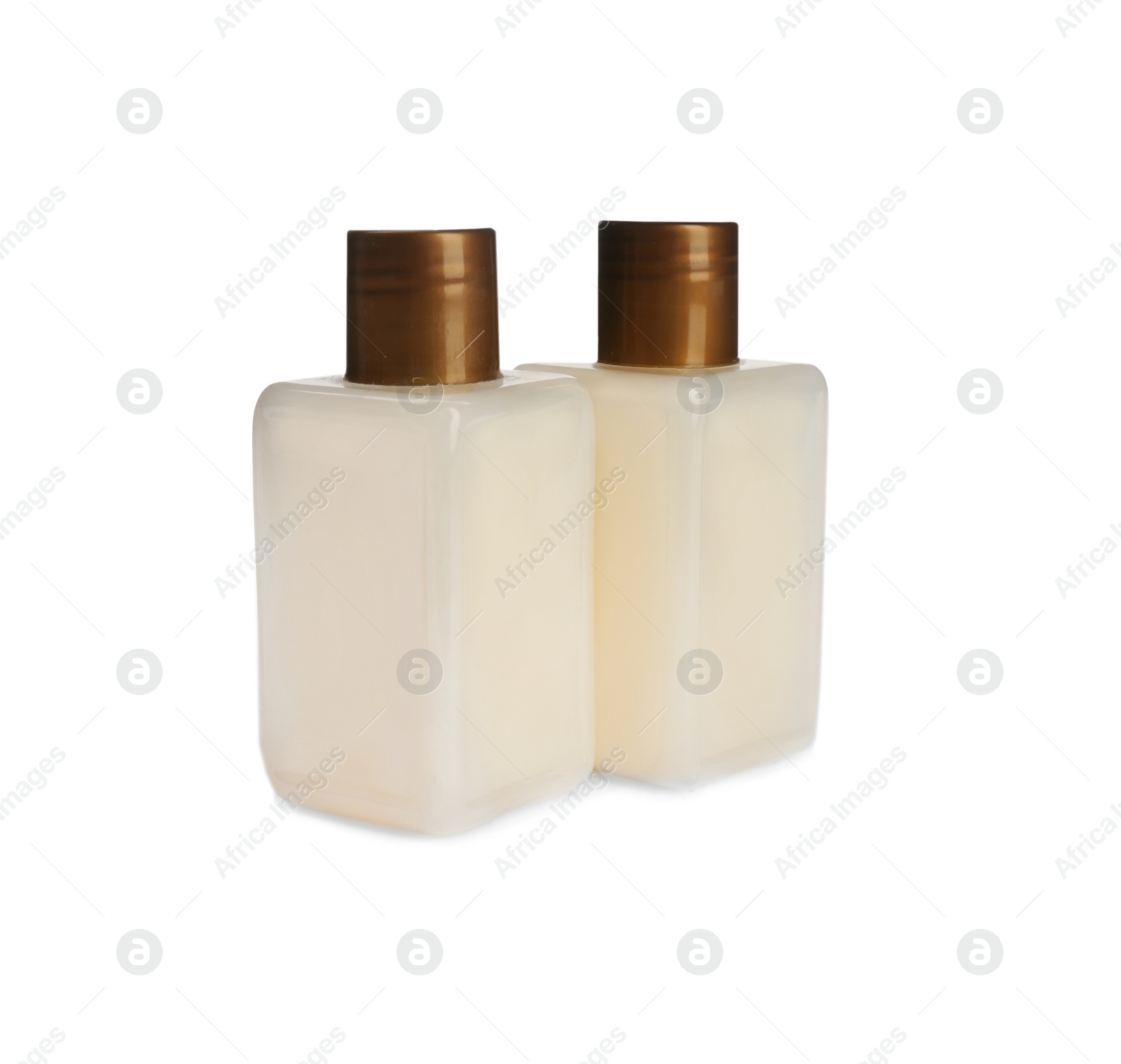 Photo of Mini bottles with cosmetic products on white background. Hotel amenities