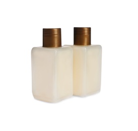 Photo of Mini bottles with cosmetic products on white background. Hotel amenities