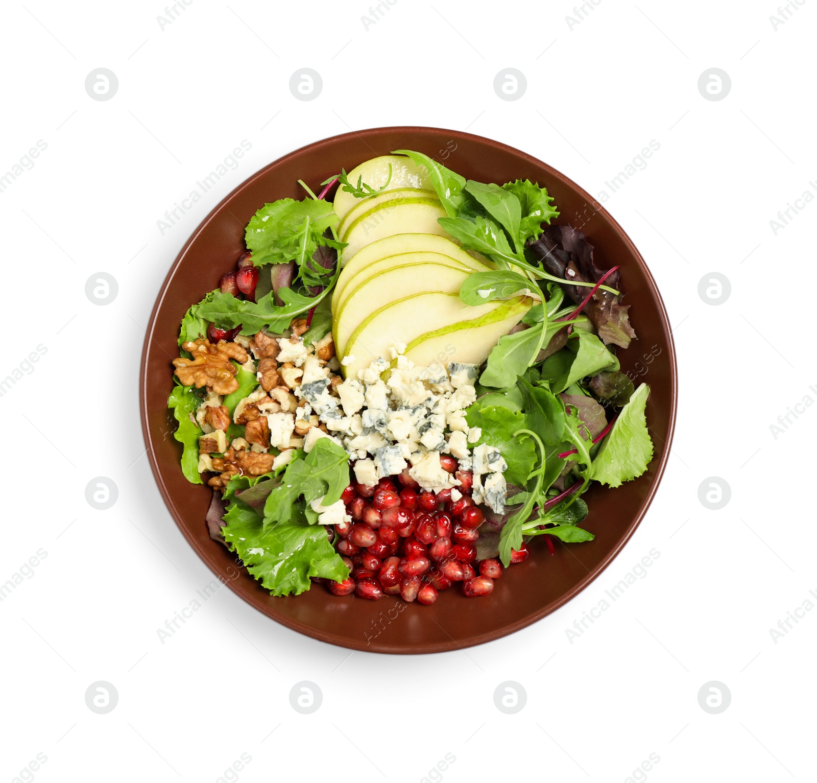 Photo of Tasty salad with pear slices, cheese, pomegranate seeds and walnuts isolated on white, top view