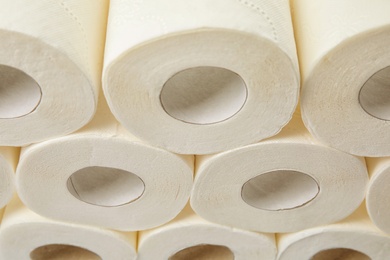 Many rolls of toilet paper as background