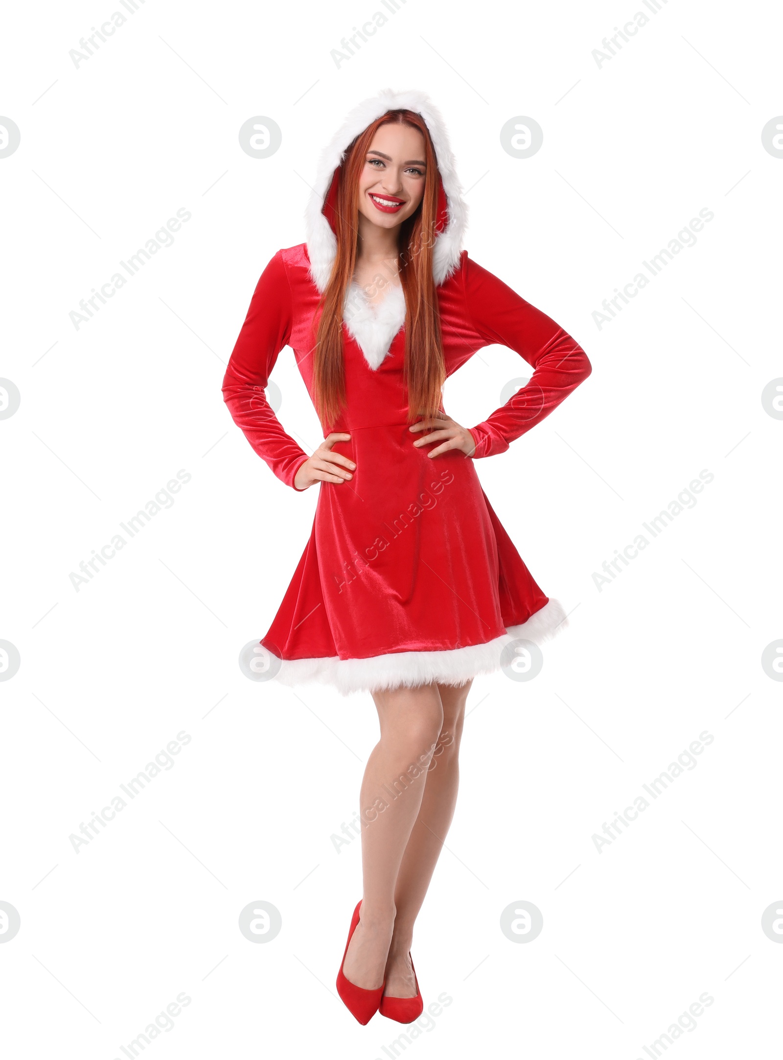 Photo of Young woman in red dress on white background. Christmas celebration