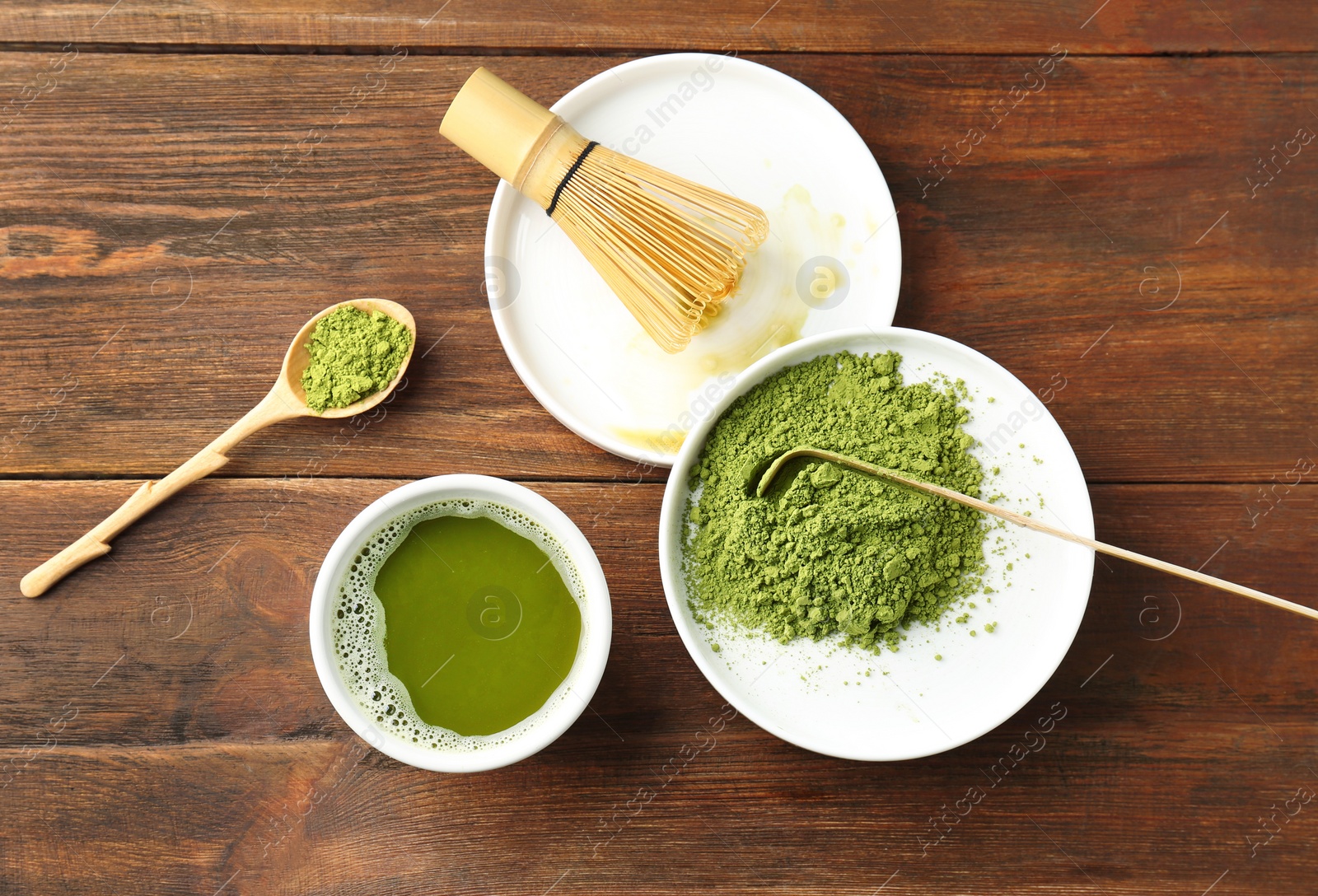 Photo of Flat lay composition with matcha tea on wooden background