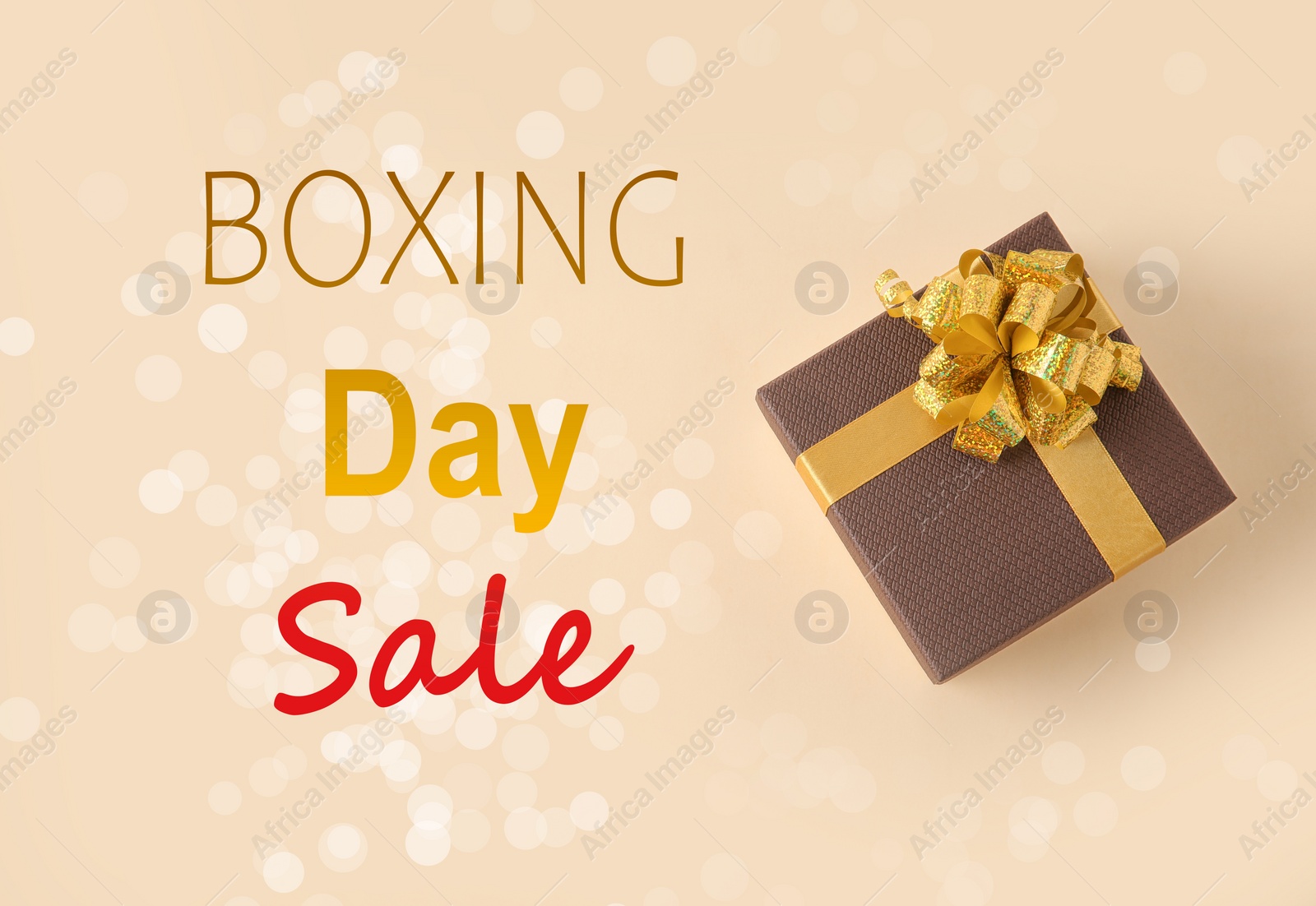 Image of Boxing day sale. Gift on light background, top view