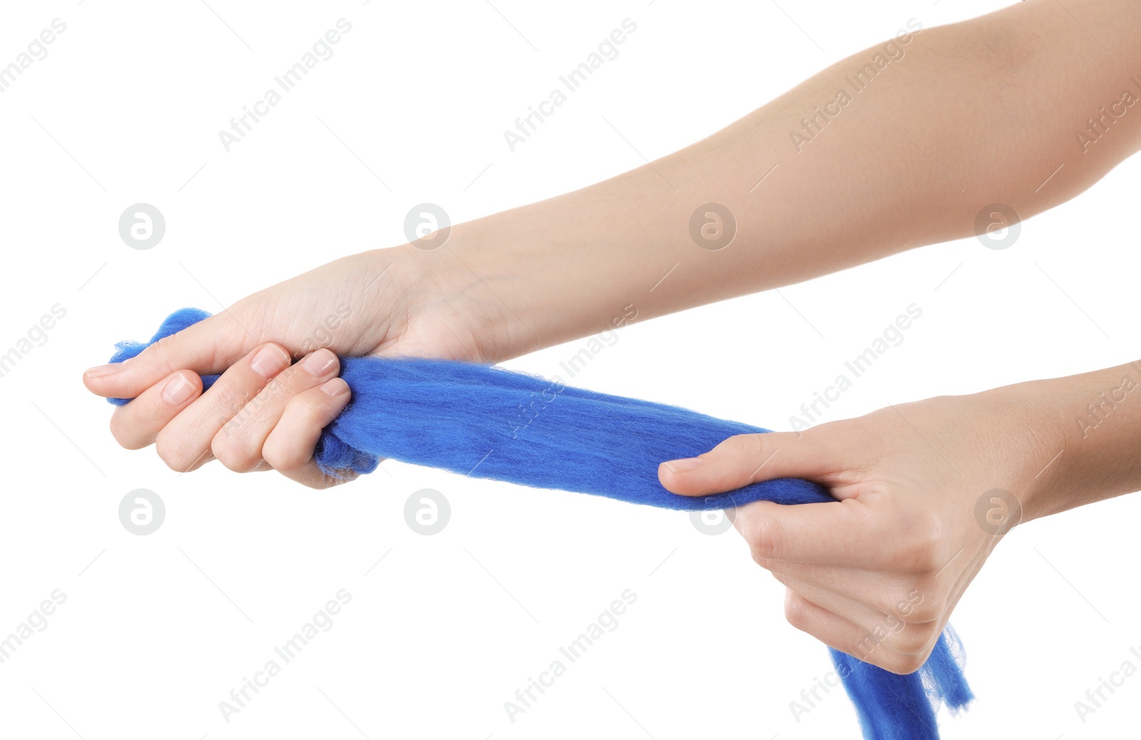 Photo of Woman holding blue felting wool on white background, closeup