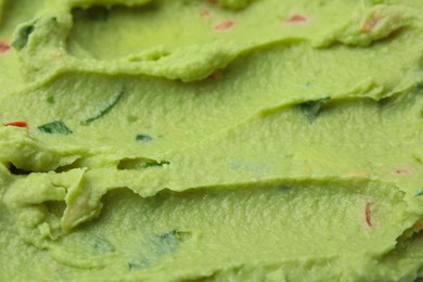 Delicious guacamole sauce as background, closeup view