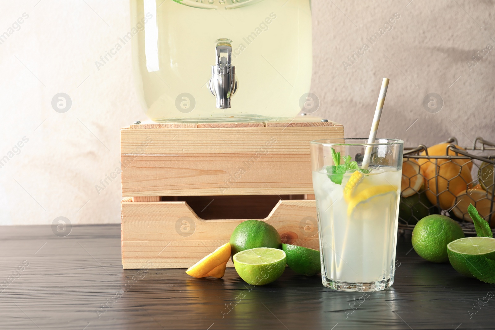 Photo of Glassware with natural lemonade on table