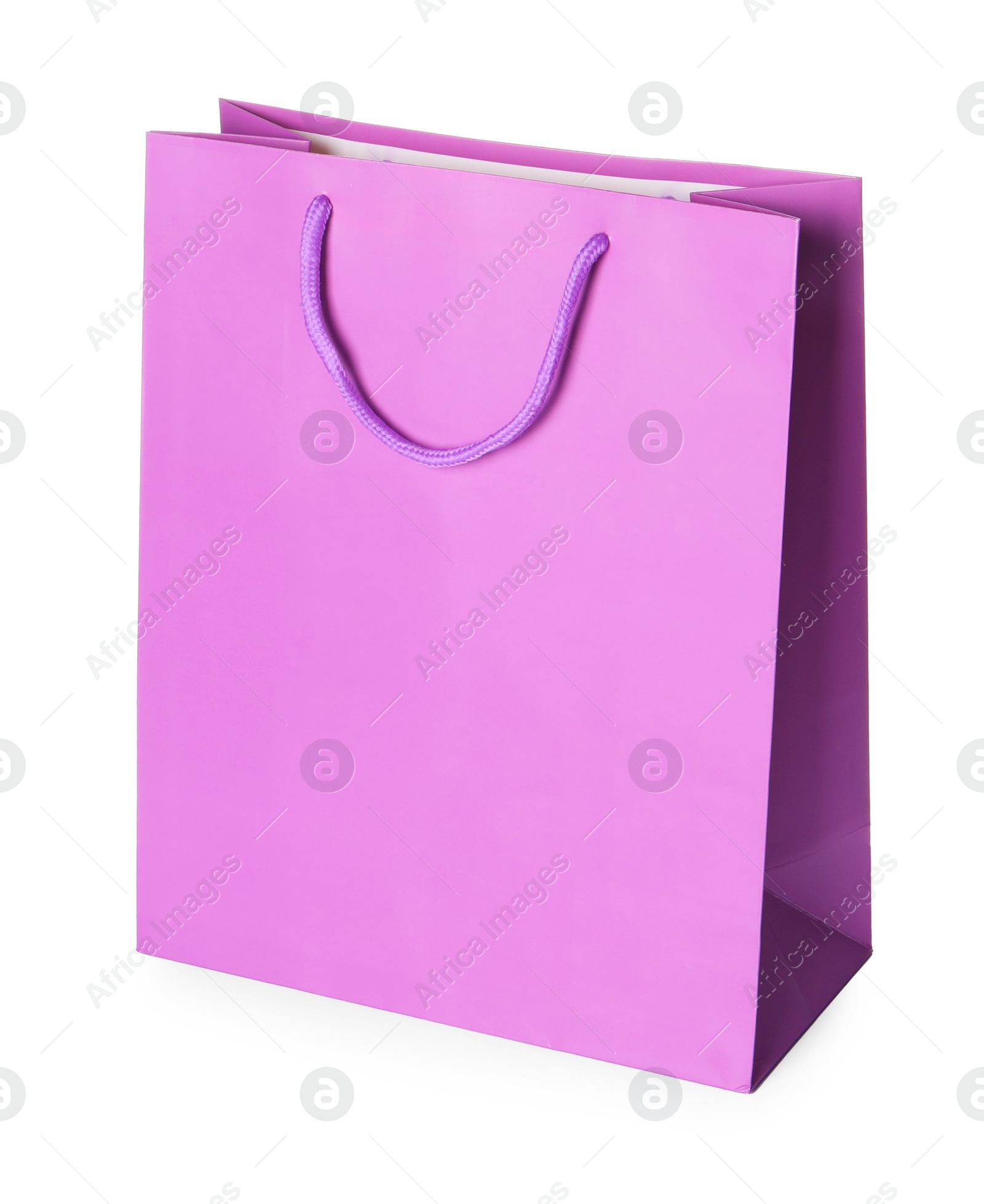 Photo of One violet shopping bag isolated on white