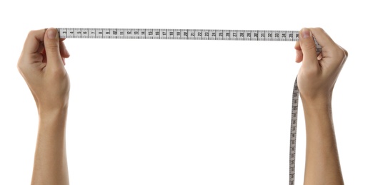 Photo of Woman holding measuring tape on white background, closeup