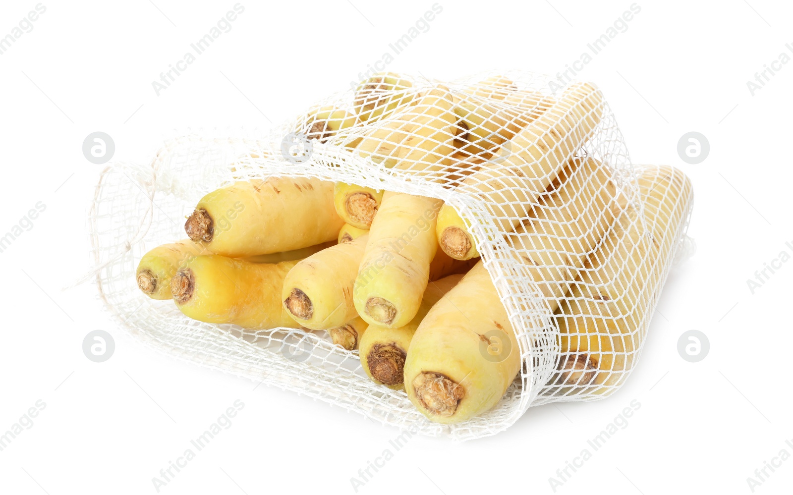 Photo of Raw carrots in mesh bag isolated on white