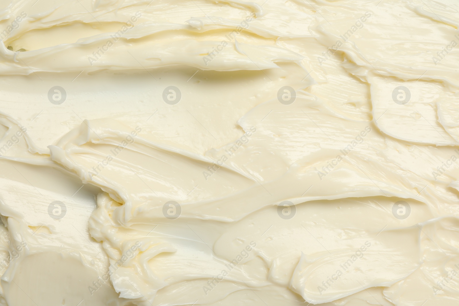 Photo of Texture of tasty butter as background, top view