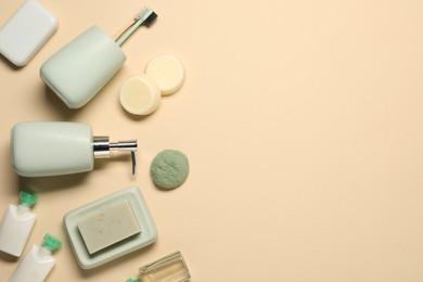 Bath accessories. Flat lay composition with personal care products on beige background, space for text