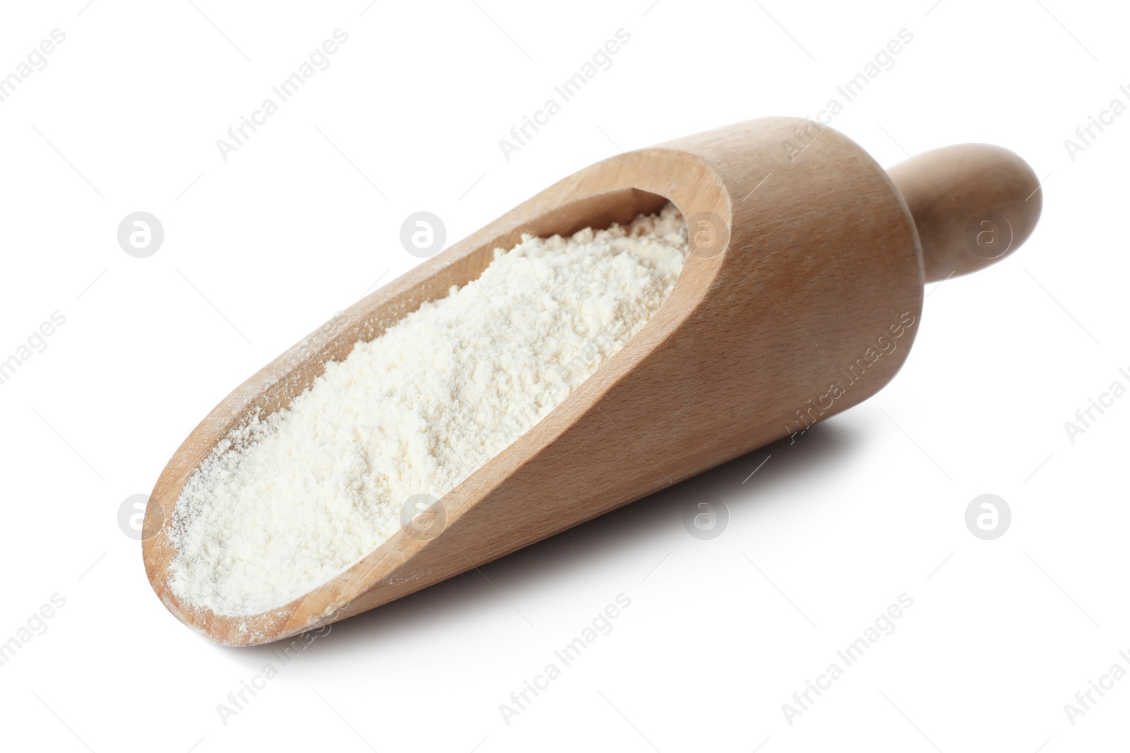 Photo of Scoop of wheat flour isolated on white