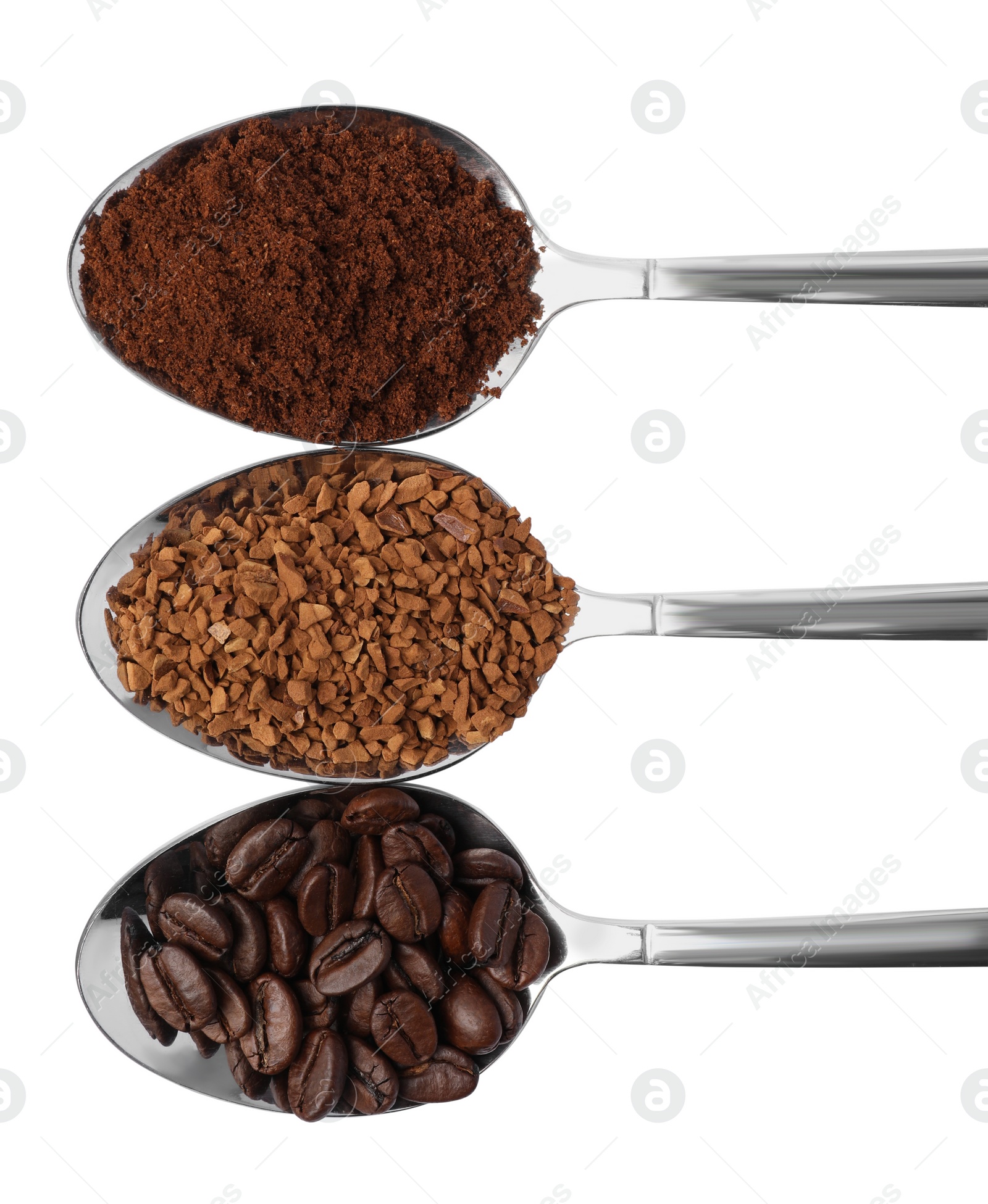 Photo of Spoons of beans, instant and ground coffee on white background, top view