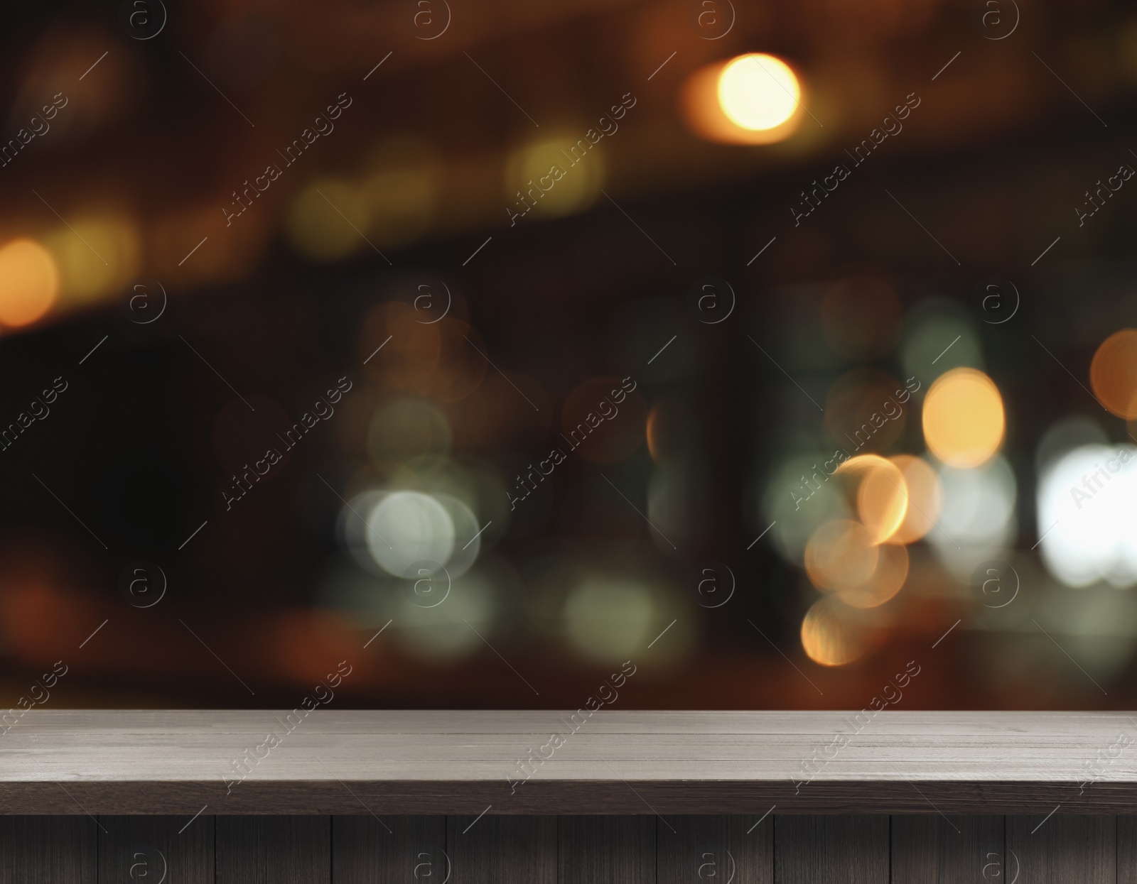 Image of Empty wooden surface against blurred background. Space for design