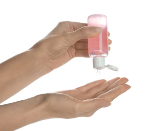 Photo of Woman applying antibacterial hand gel against white background, closeup
