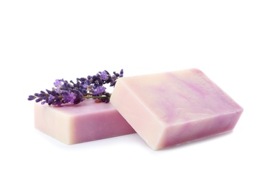 Photo of Handmade soap bars and lavender on white background