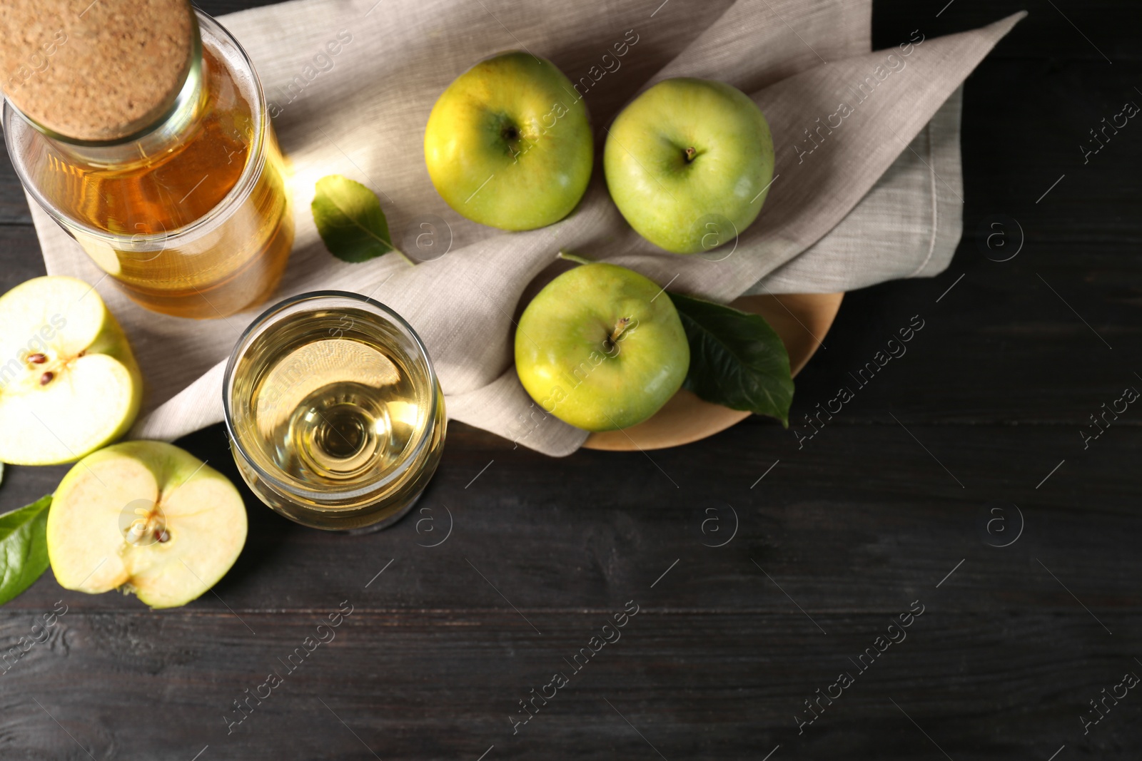 Photo of Flat lay composition with delicious apple cider on wooden table