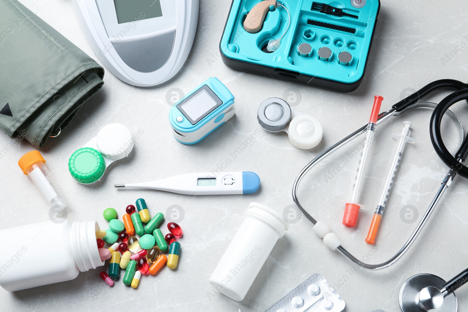 Photo of Set of medical objects on grey background, above view