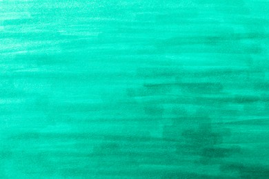 Photo of Abstract painting drawn with turquoise marker as background, top view