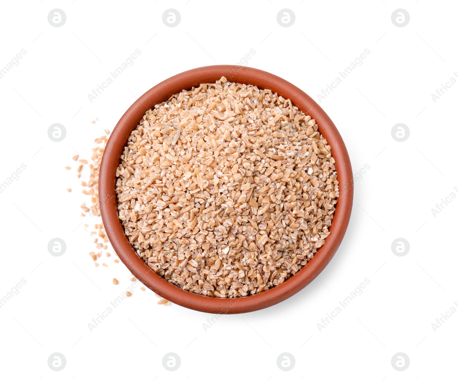 Photo of Dry wheat groats in bowl isolated on white, top view