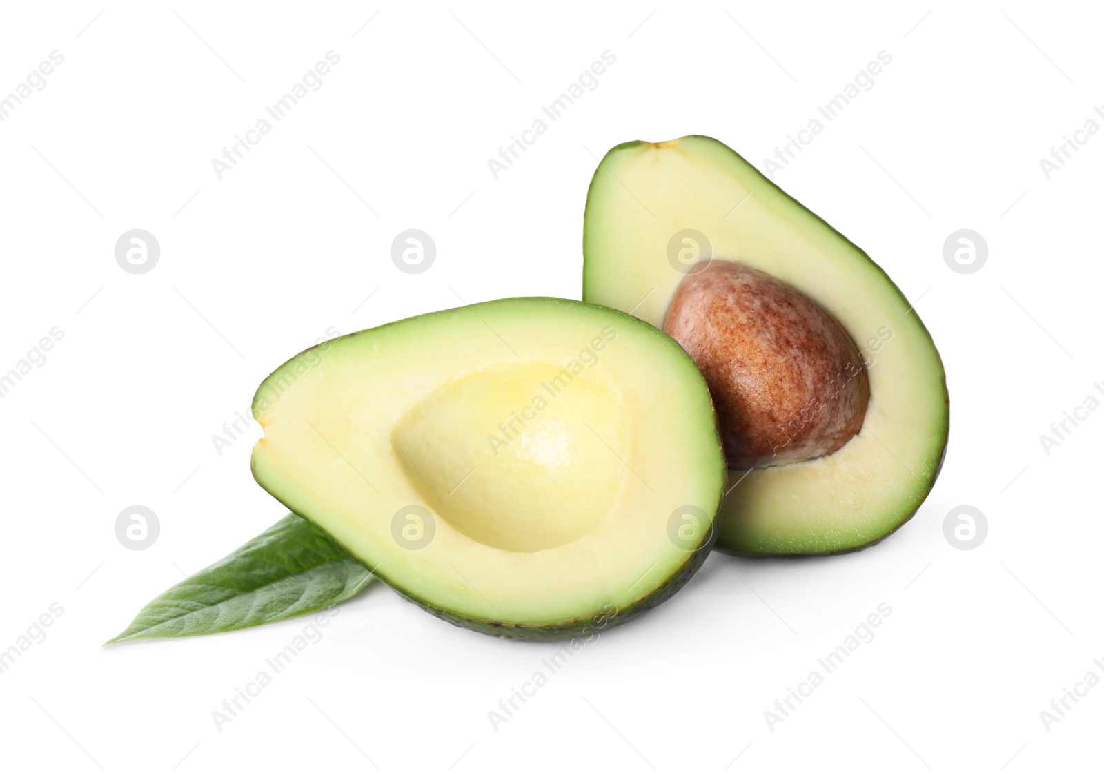 Photo of Halves of ripe avocado isolated on white