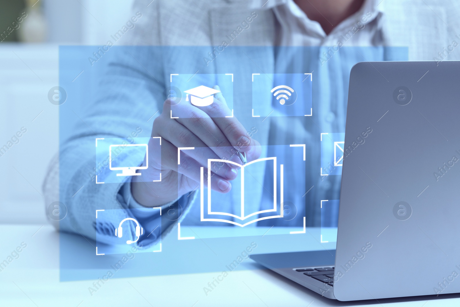 Image of Webinar. Man using virtual screen over laptop at table, closeup