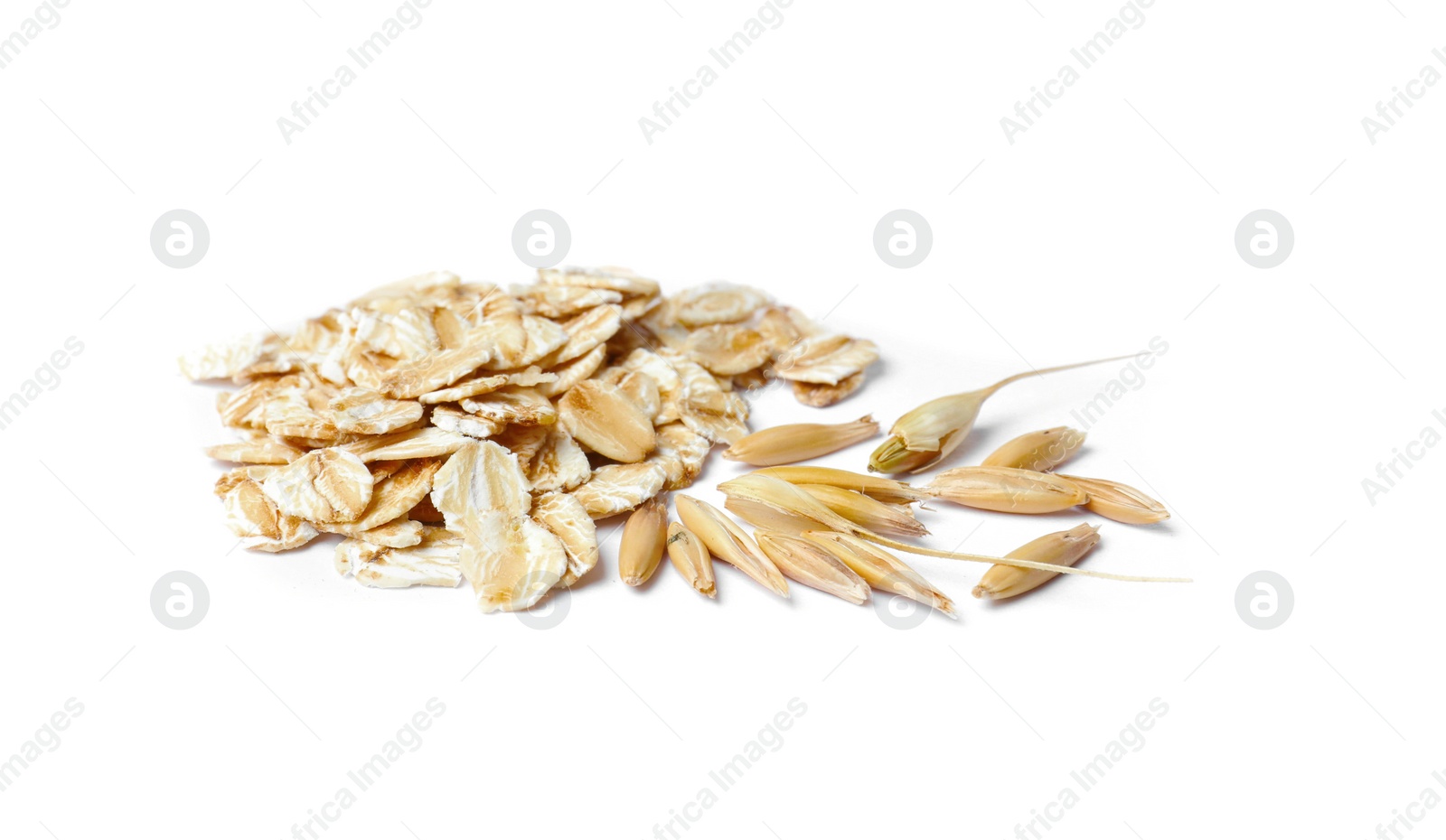 Photo of Pile of raw oatmeal on white background