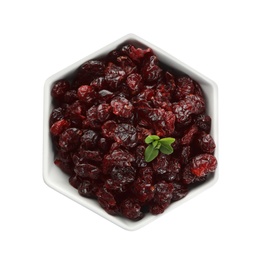 Photo of Tasty dried cranberries and leaves in bowl isolated on white, top view