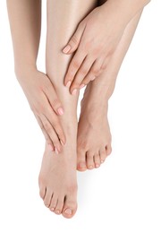 Photo of Woman with neat toenails after pedicure procedure isolated on white, closeup