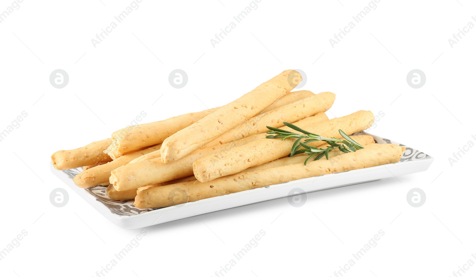 Photo of Delicious grissini with rosemary isolated on white. Crusty breadsticks