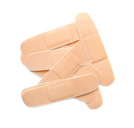 Photo of Medical sticking plasters isolated on white. First aid item