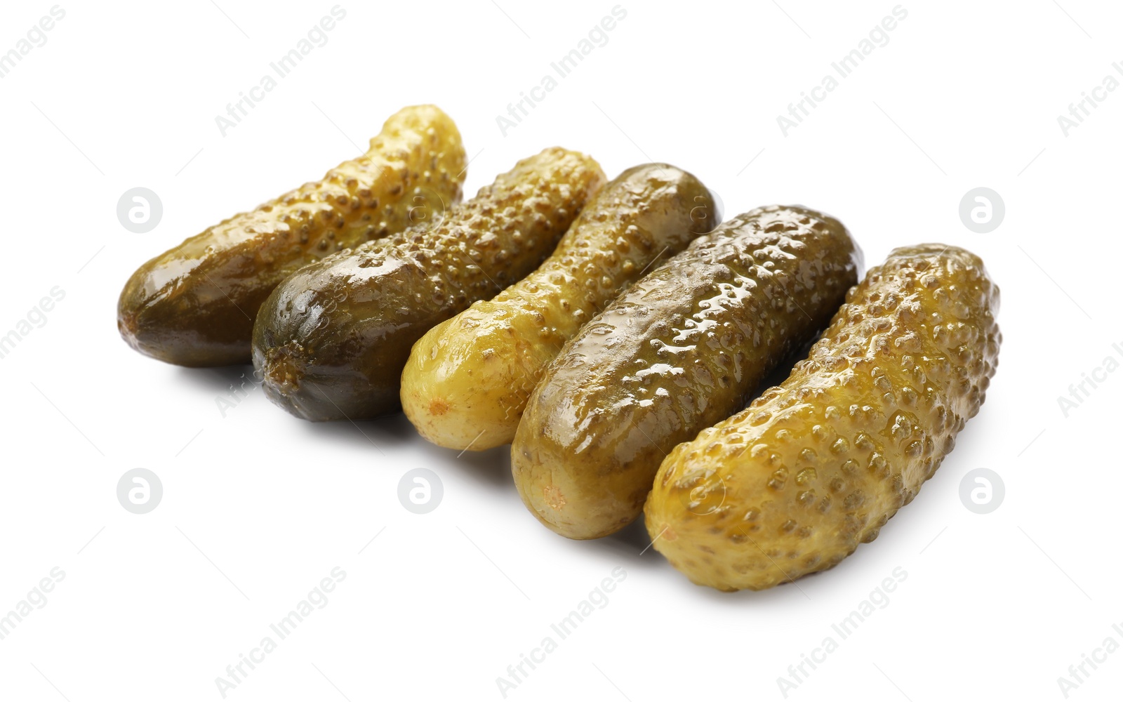 Photo of Many tasty pickled cucumbers isolated on white