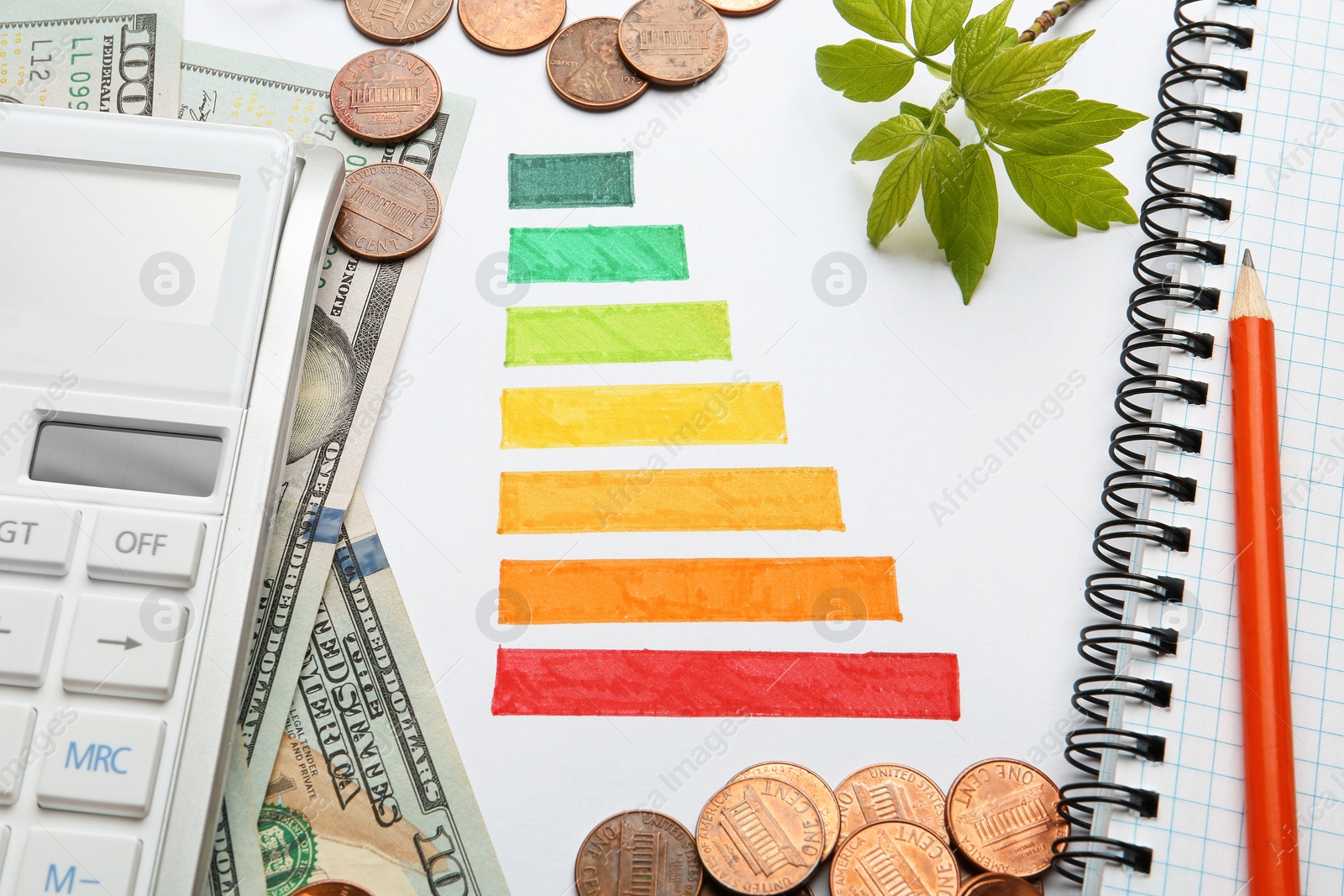 Photo of Flat lay composition with colorful chart and calculator on white background. Energy efficiency concept