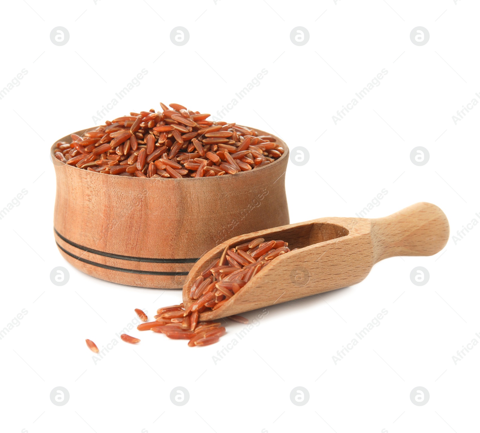 Photo of Bowl and scoop with uncooked red rice on white background