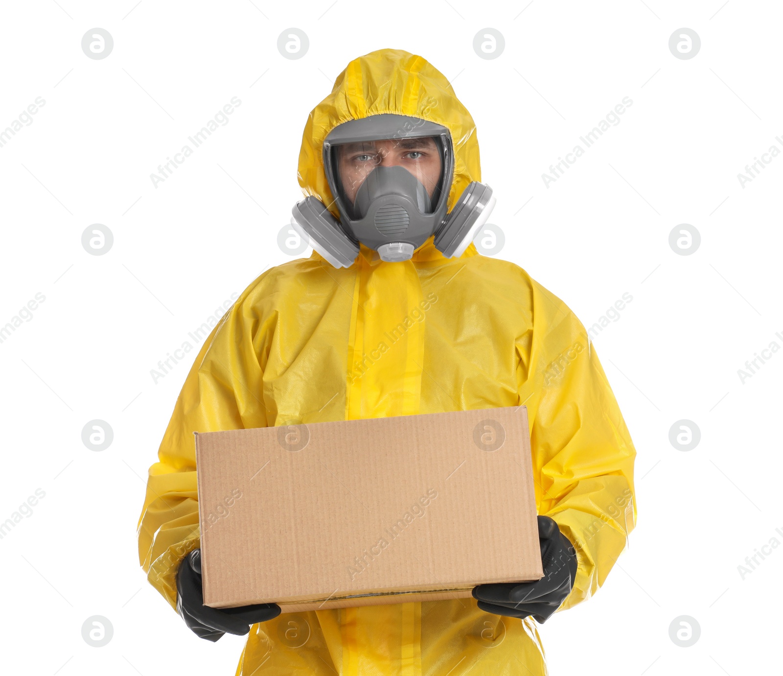 Photo of Man wearing chemical protective suit with cardboard box on white background. Prevention of virus spread