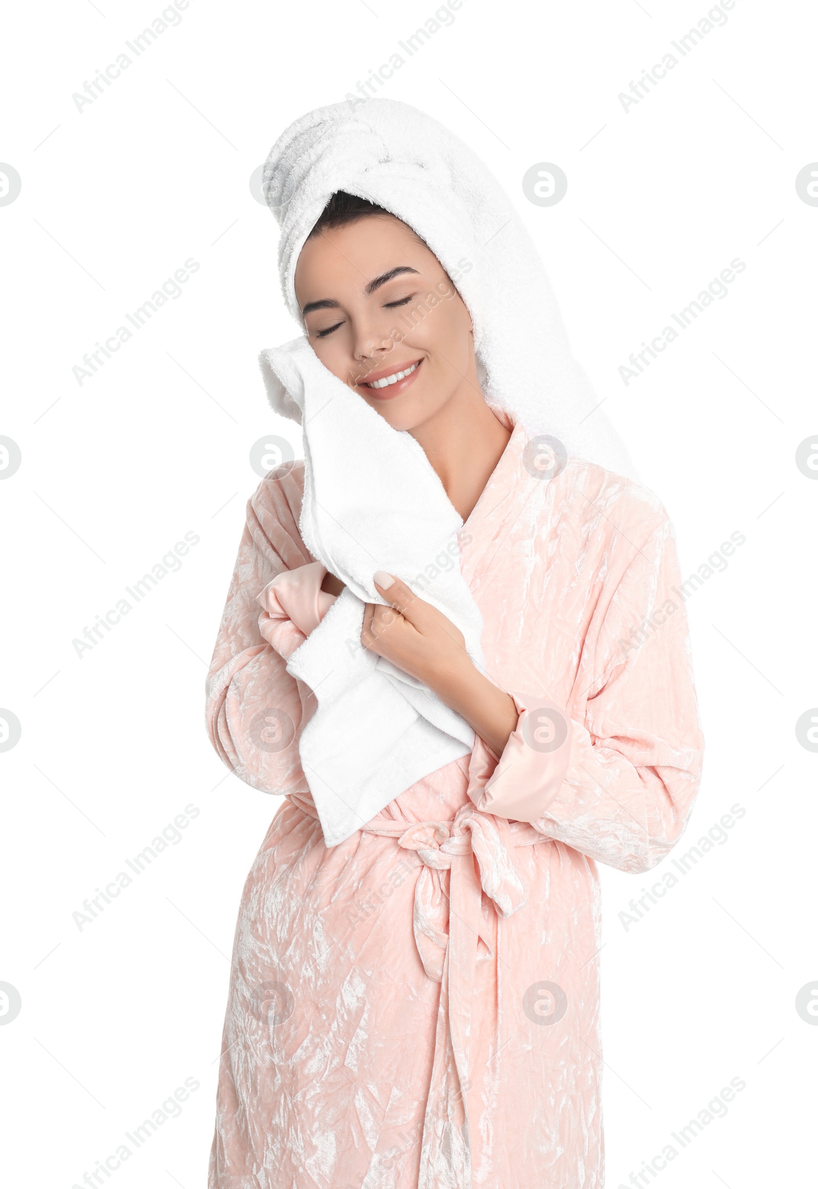 Photo of Young woman wiping face with towel on white background