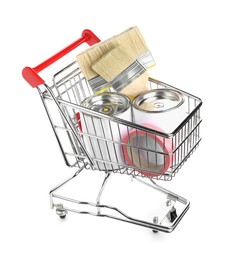 Photo of Small shopping cart with set of painting tools isolated on white