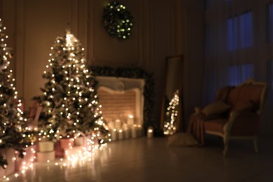 Blurred view of festive room interior with Christmas trees