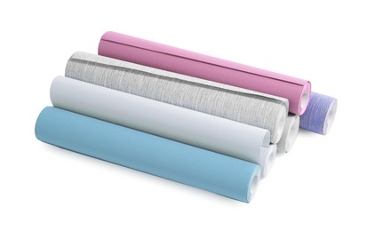 Image of Different colorful wallpaper rolls isolated on white