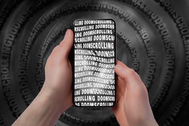 Image of Doomscrolling concept. Man holding mobile phone with distorted words on screen, closeup
