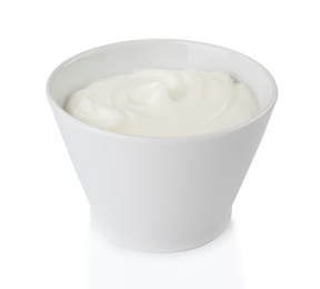 Photo of Bowl with sour cream on white background