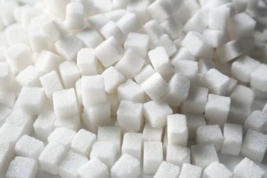 Photo of Refined sugar cubes as background