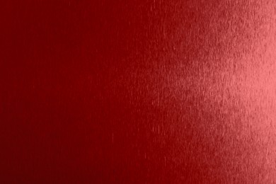 Image of Beautiful red foil as background, top view