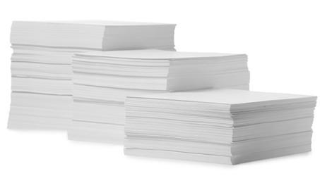 Photo of Stacks of paper sheets on white background